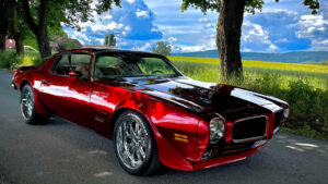 candy red Pontiac Firebird restomod.