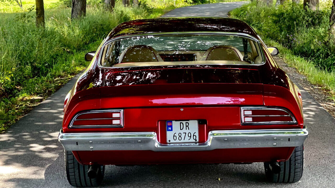 candy red Pontiac Firebird restomod.