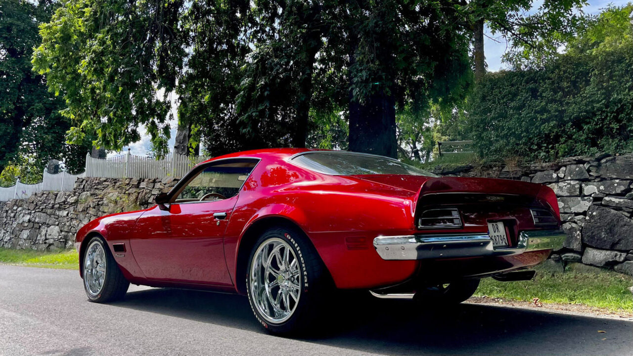 candy red Pontiac Firebird restomod.