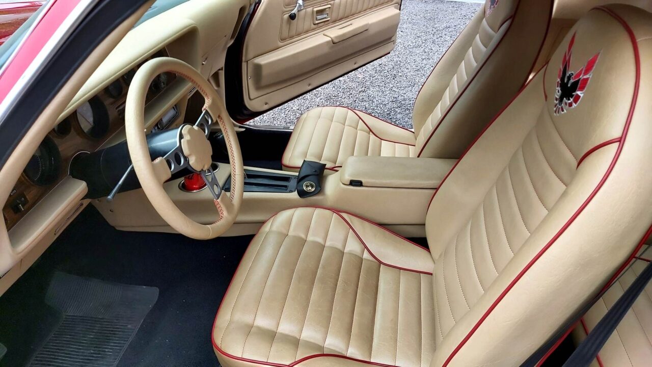 candy red Pontiac Firebird restomod interior.