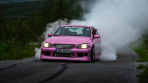 Pink drifting-inspired Lexus IS / Toyota Altezza.