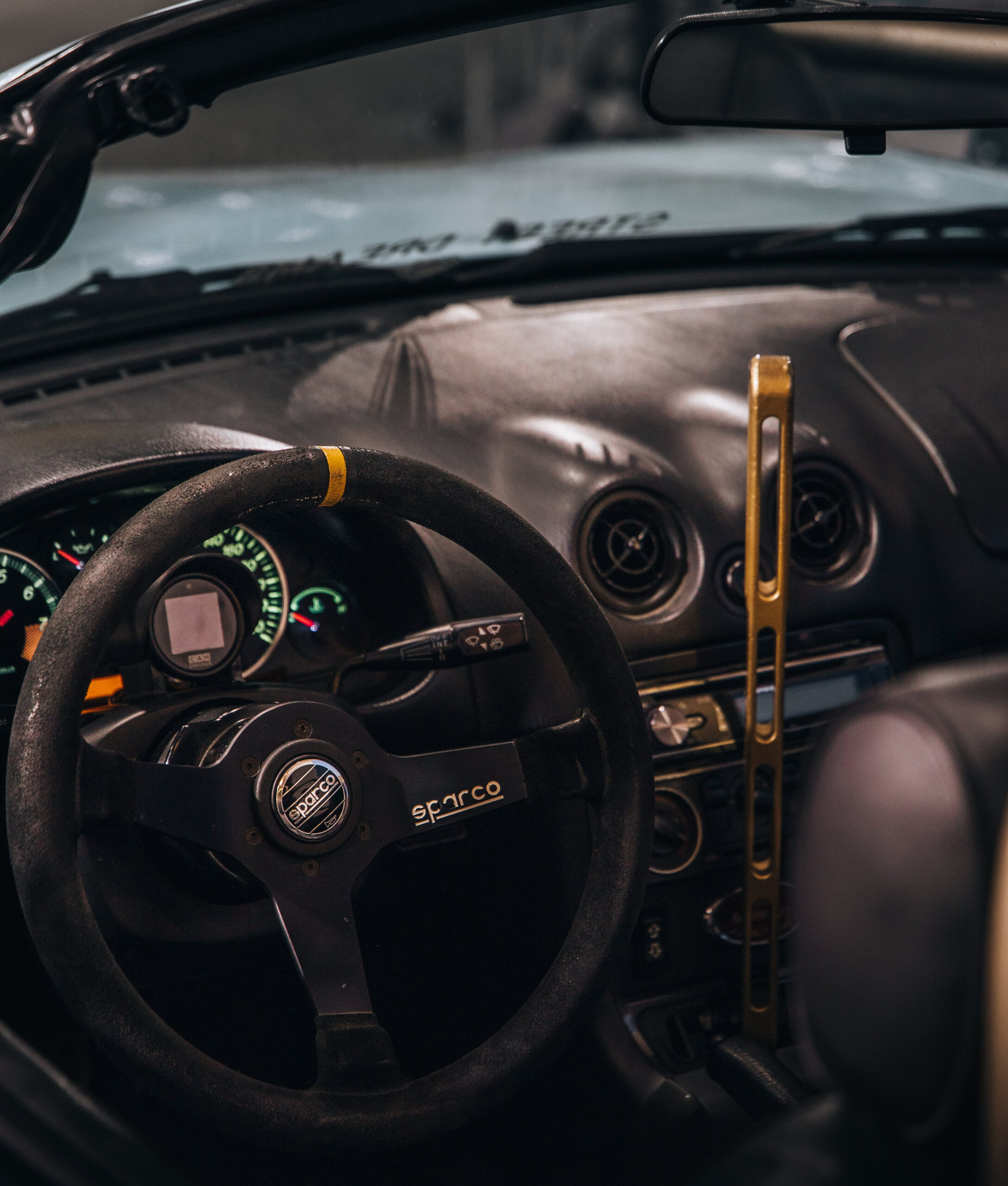 Modified Mazda Miata / MX-5 interior with hydraulic handbrake.