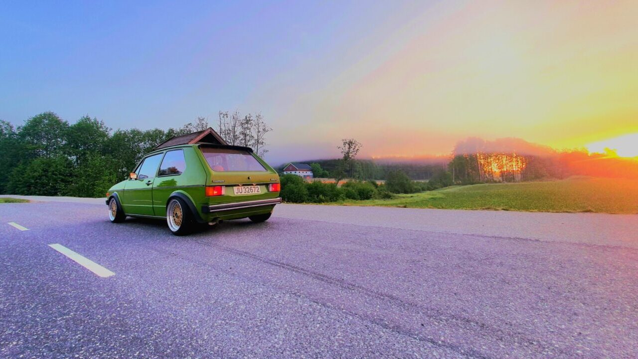 Modified Lofoten Green Mk1 VW Golf in the sunset.