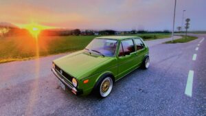 Modified Lofoten Green Mk1 VW Golf in the sunset.